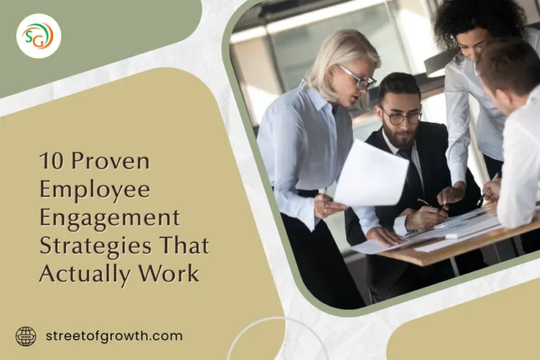 Business team discussing documents at a table as part of employee engagement strategies in a modern office setting