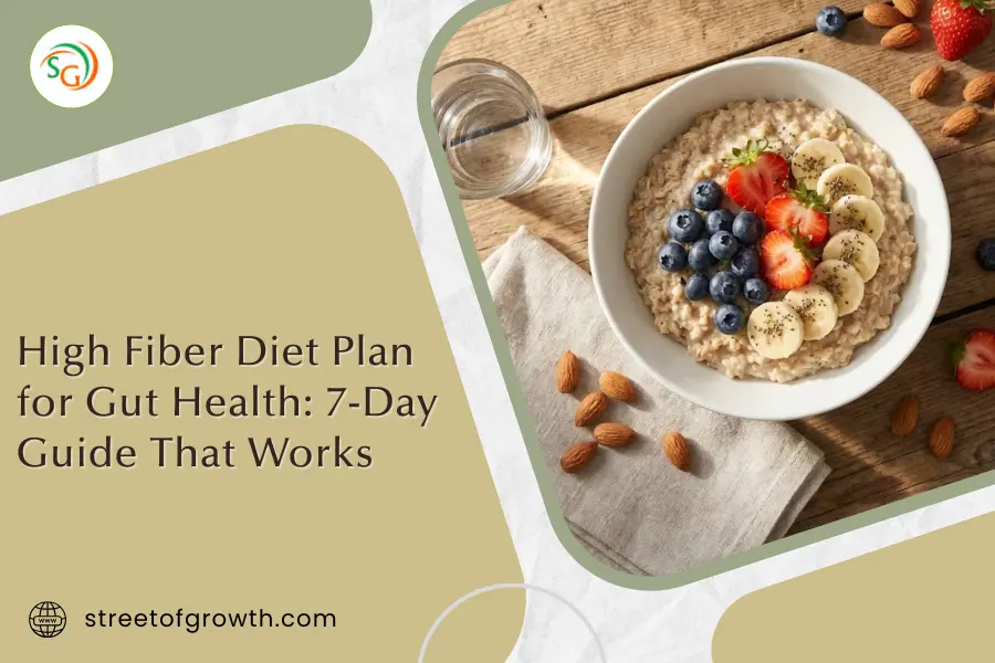 Top-down view of an oatmeal bowl with fresh berries and almonds, illustrating a high fiber diet plan for gut health and 7-day guide.