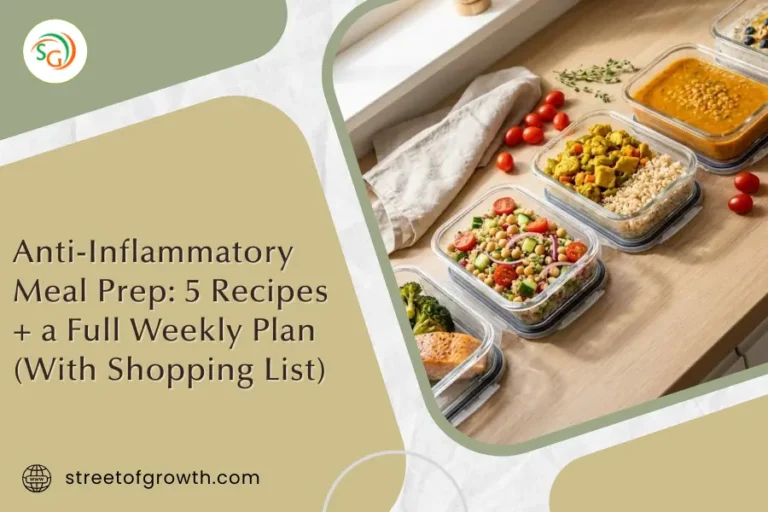 Glass meal prep containers filled with healthy salads, lentils, and salmon on a wooden table, illustrating an anti-inflammatory meal prep guide with recipes.