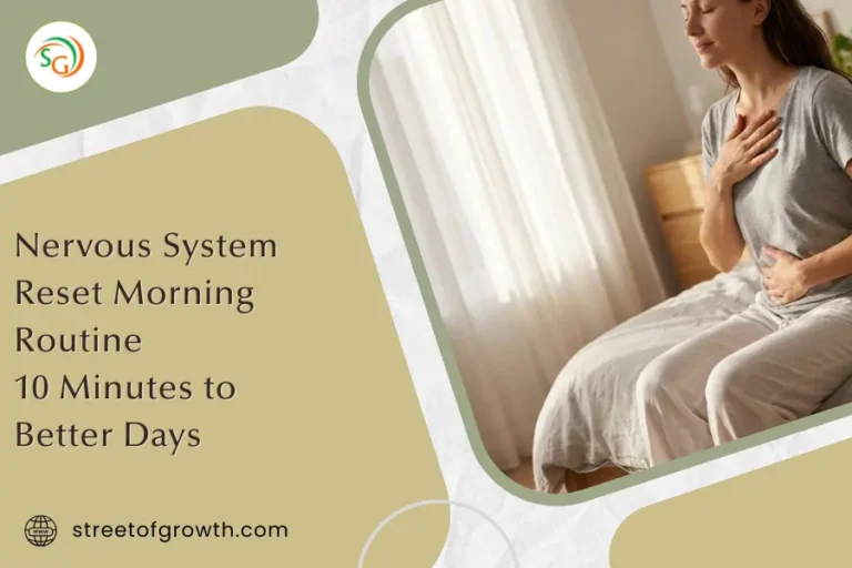 Woman sitting on a bed with hands on her chest and stomach, practicing a nervous system reset morning routine to start the day calmly.