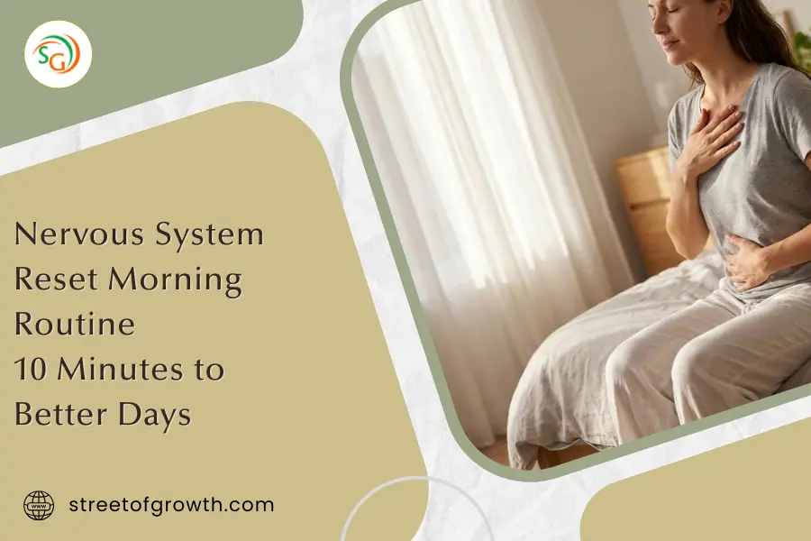 Woman sitting on a bed with hands on her chest and stomach, practicing a nervous system reset morning routine to start the day calmly.