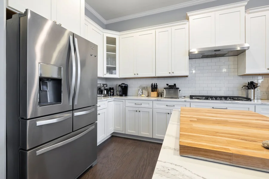 Modern smart refrigerator in a home kitchen with connected technology features
