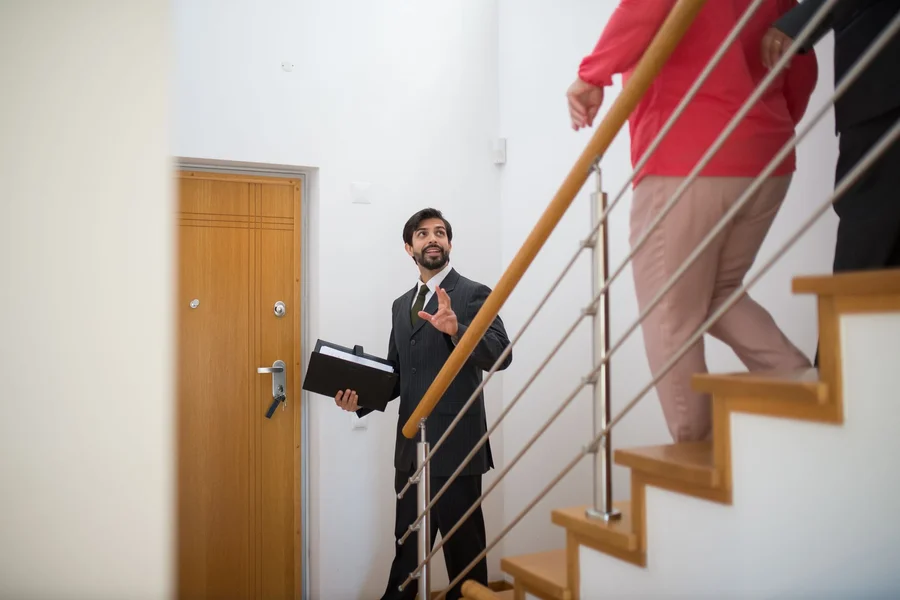Listing Photography Real estate agent photographing a home interior for a property listing